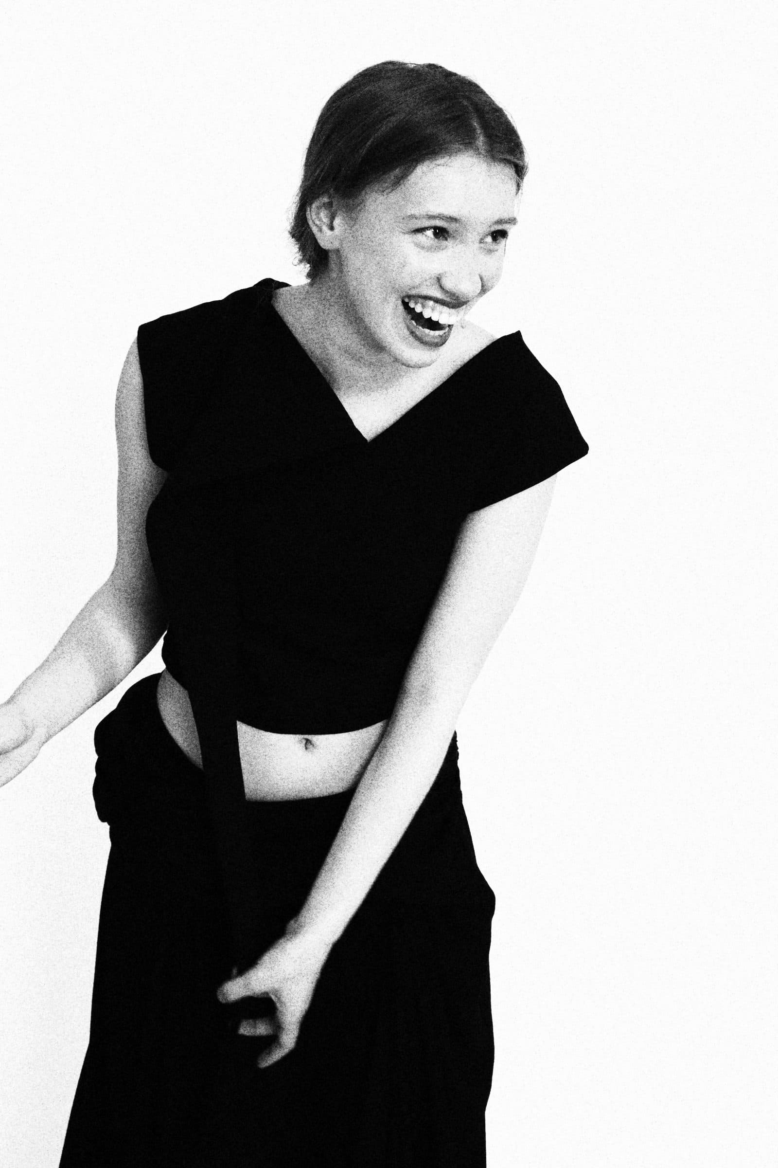 asymmetric black top with back detail
