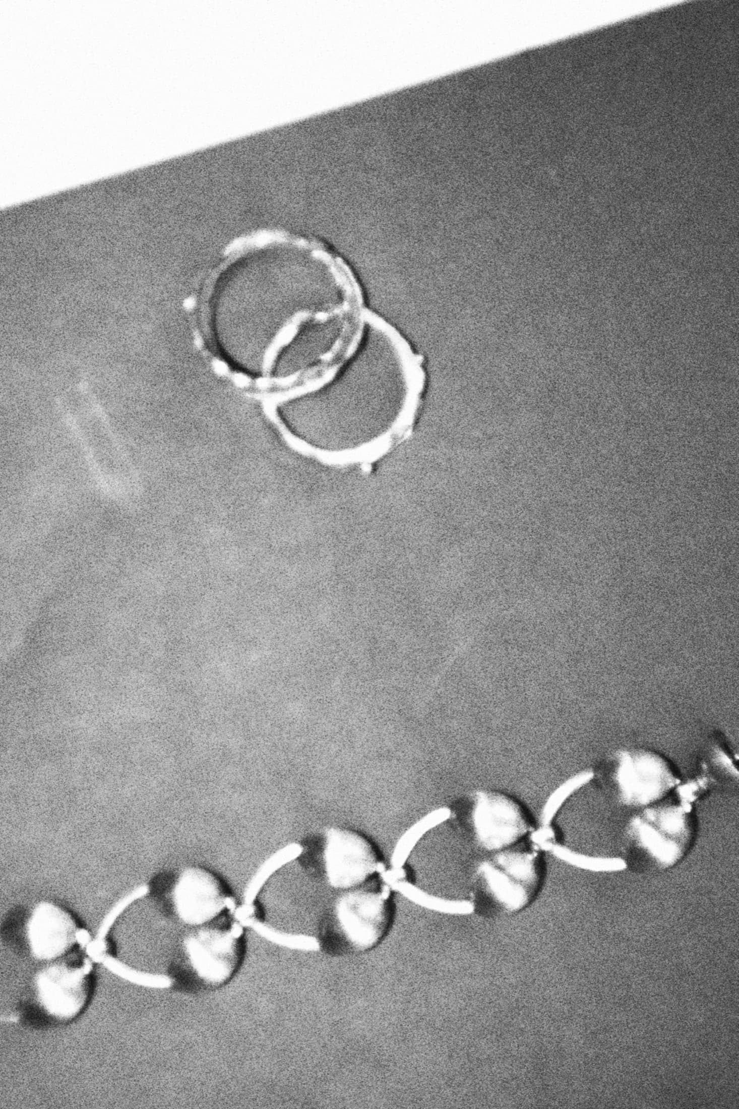 silver mono earring 1